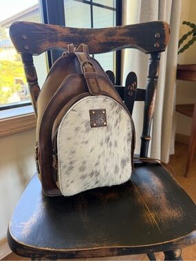 STS Ranchwear Brown Leather Backpack with White Speckled Haircalf Front